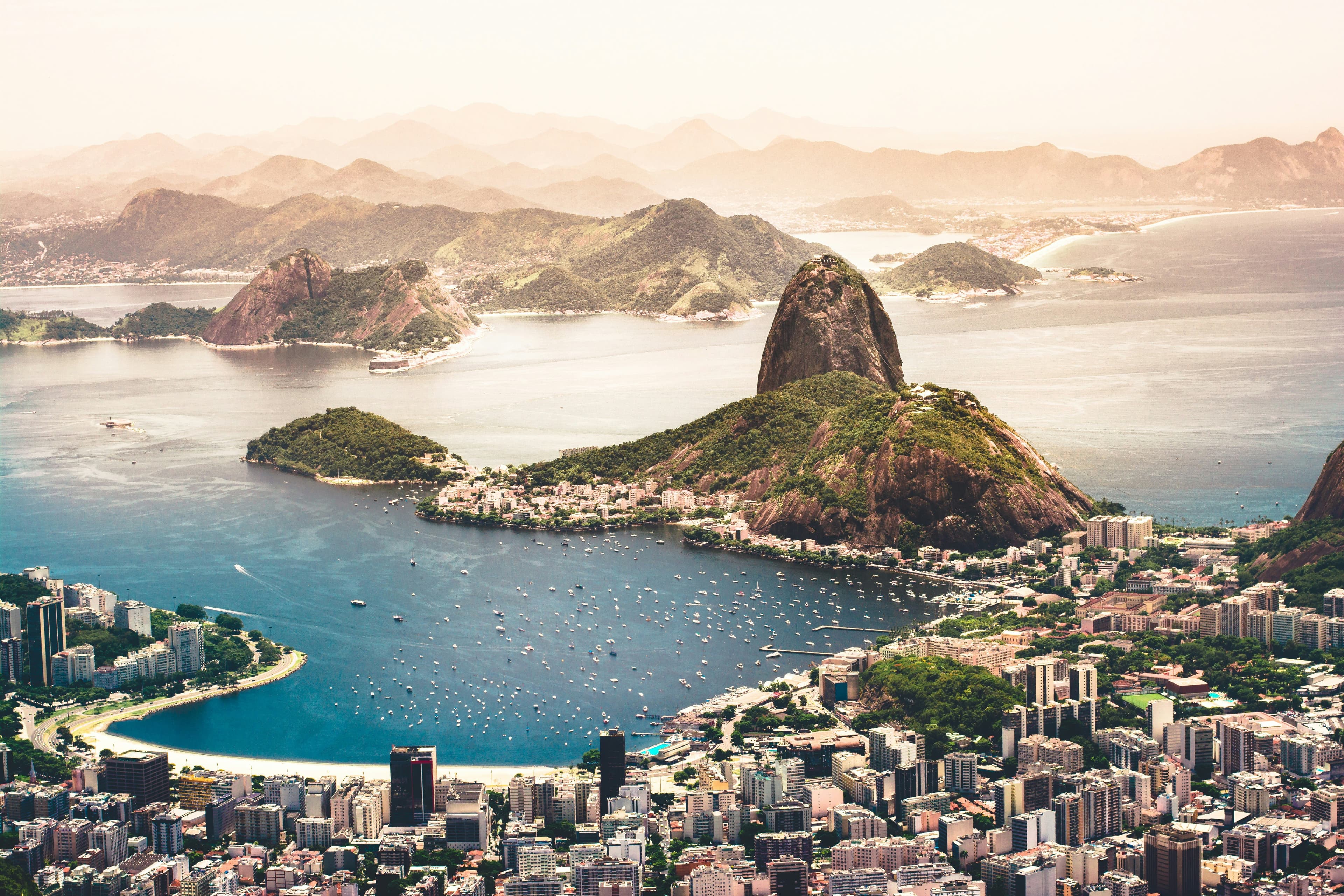 Golden hour over Rio de Janeiro's Sugarloaf Mountain and Botafogo Bay